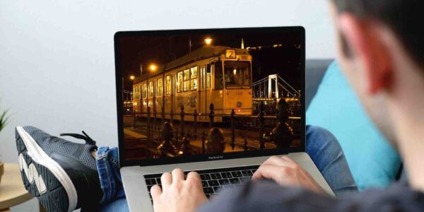 Person-Playing-Murder-Mystery-On-Laptop