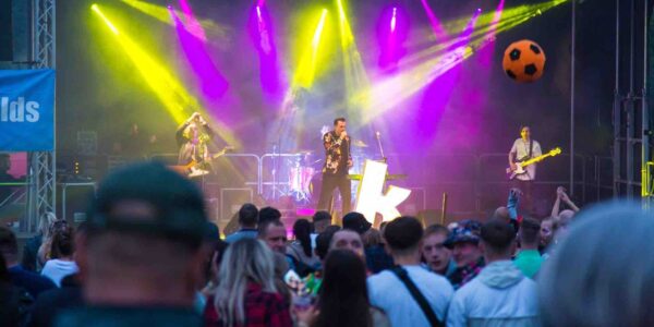 Tribute-Acts-Performing-On-Stage