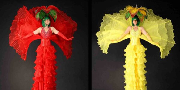 Red-And-Yellow-Flower-Stilt-Walkers