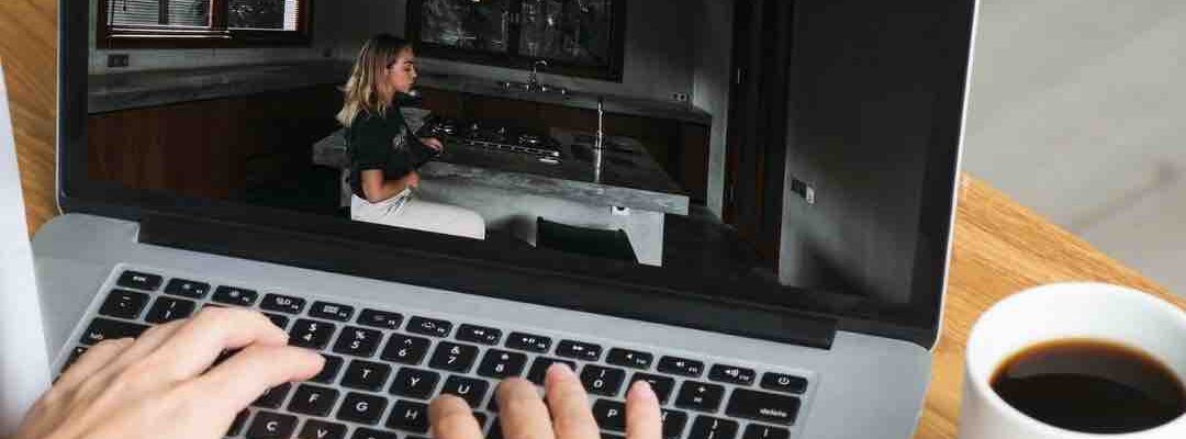 Woman-Playing-Virtual-Escape-Room-On-Laptop Woman-Playing-Virtual-Escape-Room-On-Laptop
