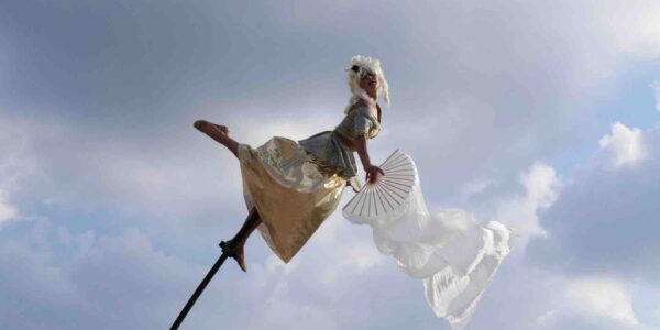 Aerial-Performer-Holds-Fan