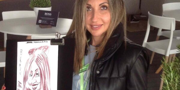 Guest-At-Business-Event-Posing-With-Caricature