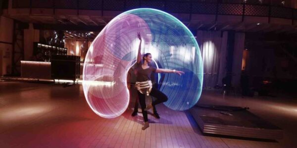 Light-Painting-Artist-Creates-Glow-Around-Dancer