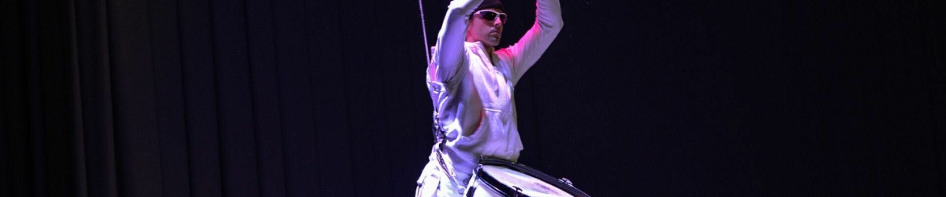 Male-Aerial-Dancer-With-Drum Male-Aerial-Dancer-With-Drum