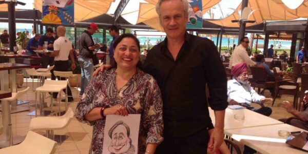 Guest-Posing-With-Finished-Caricature
