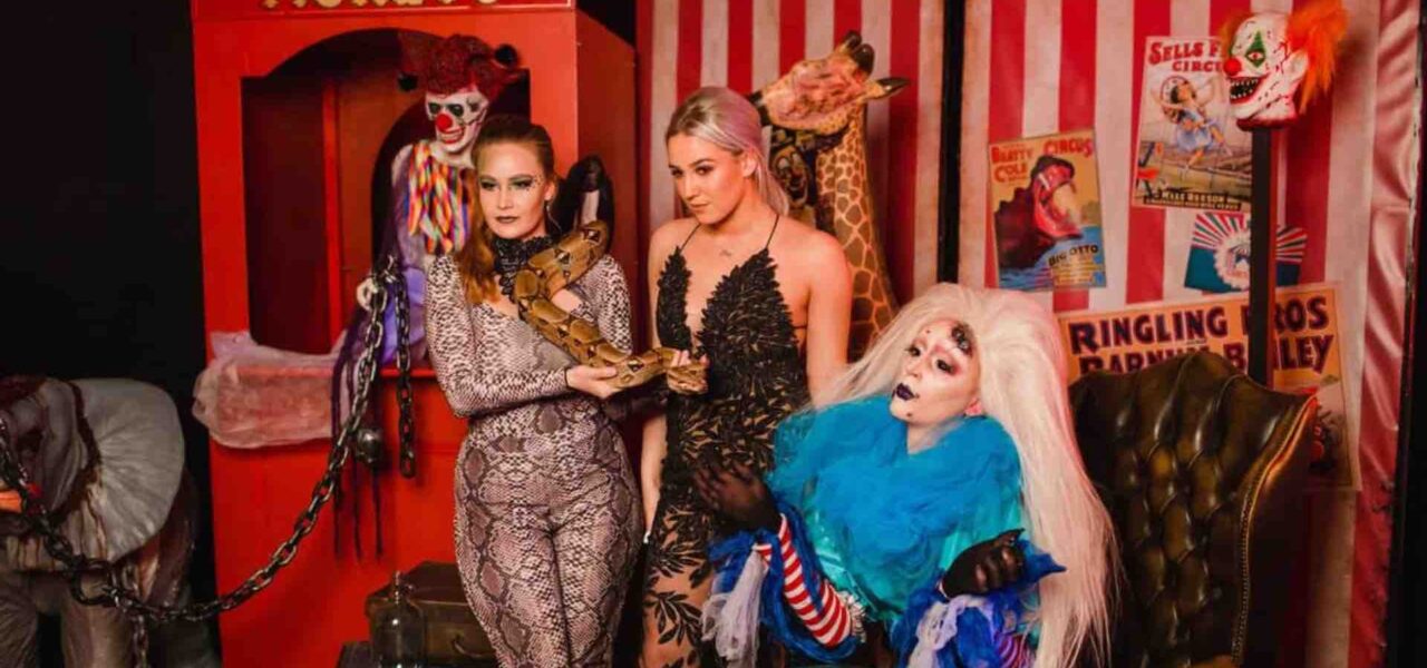 Guest-Posing-In-Twisted-Circus-Themed-Venue