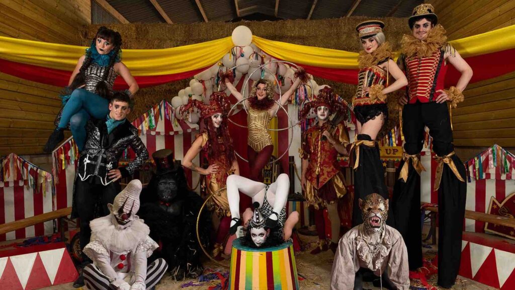 Group photo of twisted circus themed performers