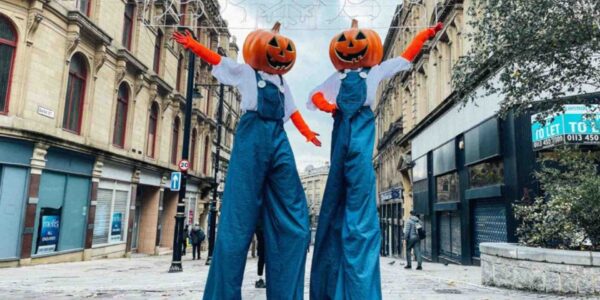 Pumpkin-Themed-Stilt-Walkers