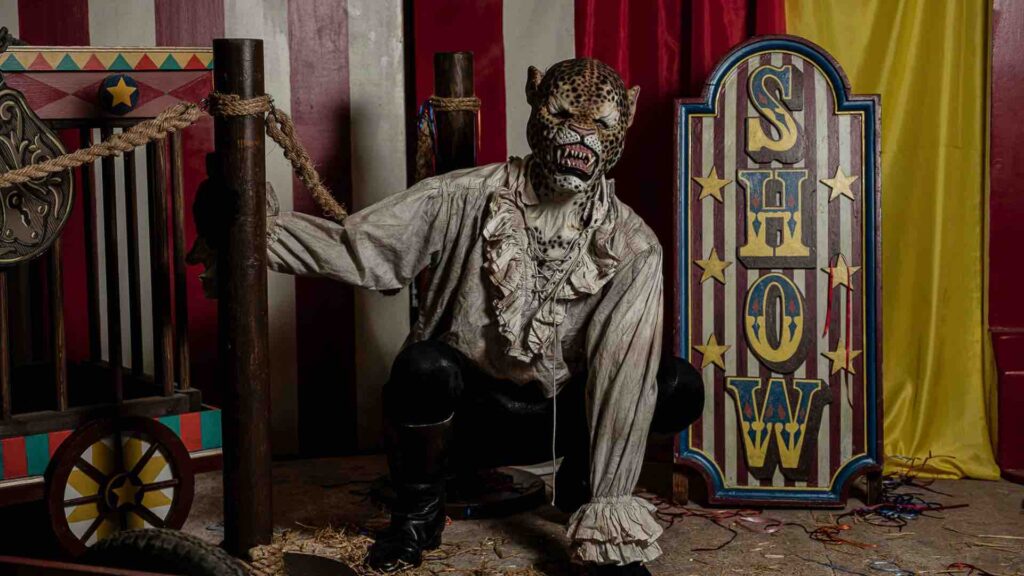 Leopard man performer at circus