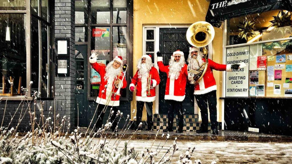 Brass band wearing santa outfits