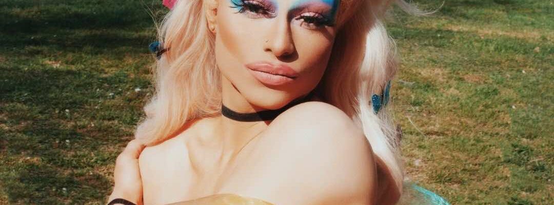 Drag-Performer-In-Pride-Outfit Drag-Performer-In-Pride-Outfit