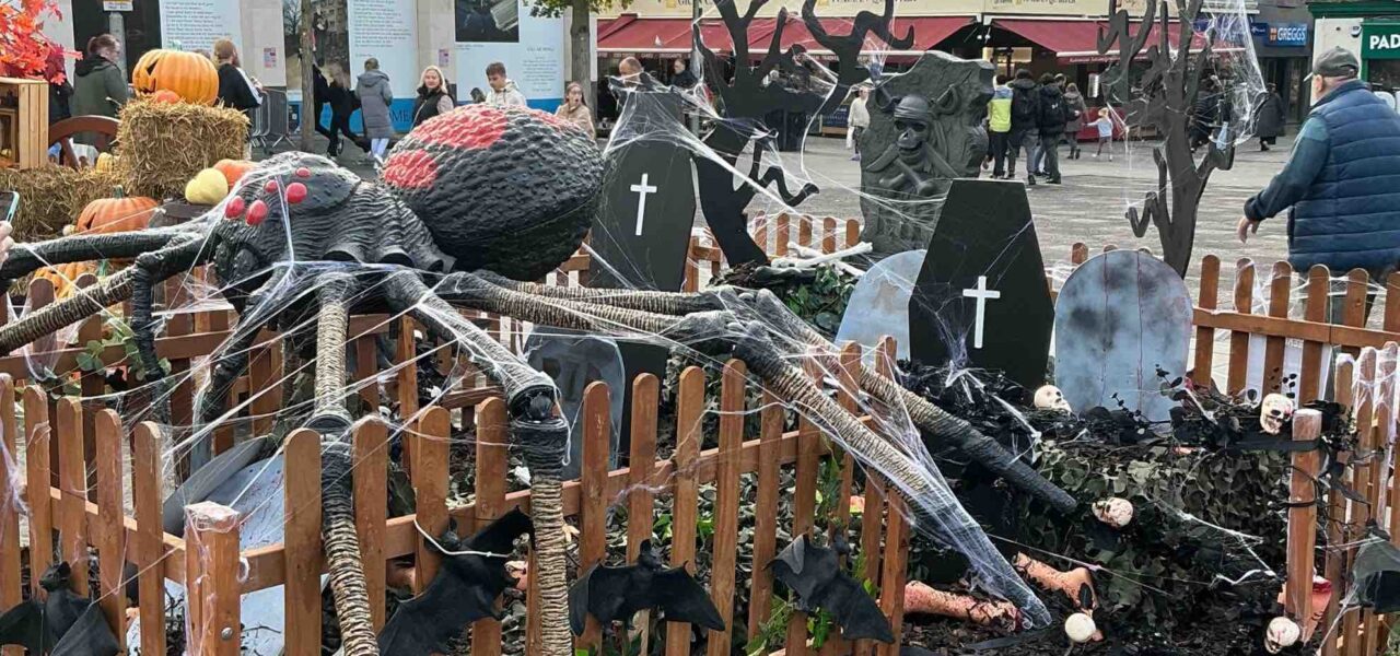 Spooky Halloween event decor and styling, including a giant spider graveyard, at Liverpool town centre.
