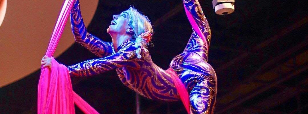 Aerial-Performer-With-Red-Silks Aerial-Performer-With-Red-Silks