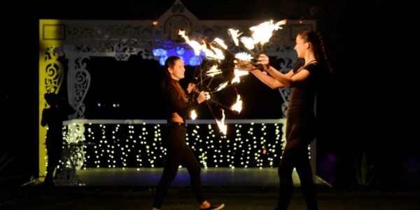 Fire-Performers-Holding-Fire-Fans