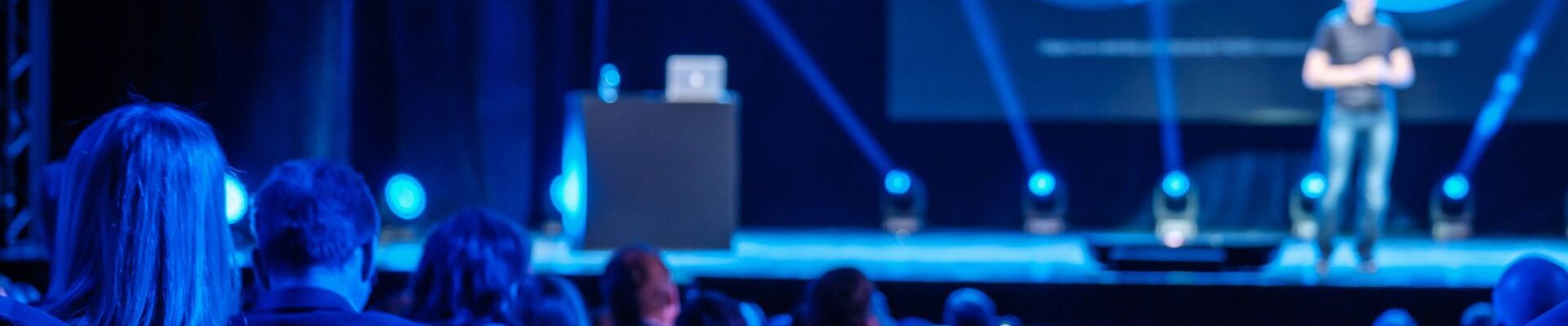 Sales-Kick-Off-Conference-Guest-Speaker-On-Stage