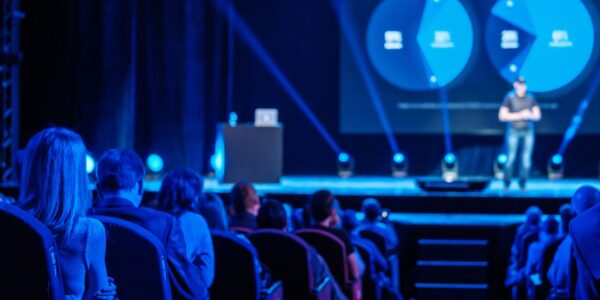 Sales-Kick-Off-Conference-Guest-Speaker-On-Stage
