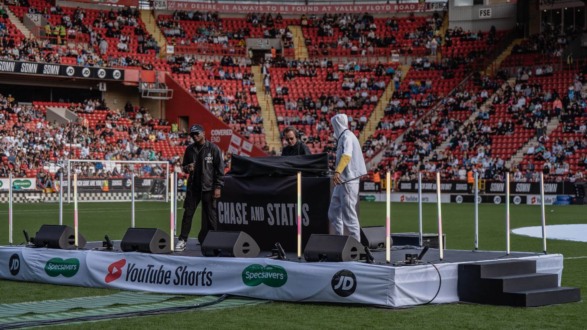 Sidemen Charity Football Match 2022 Chase and Status Pre Match performance on Charlton Stadium pitch.
