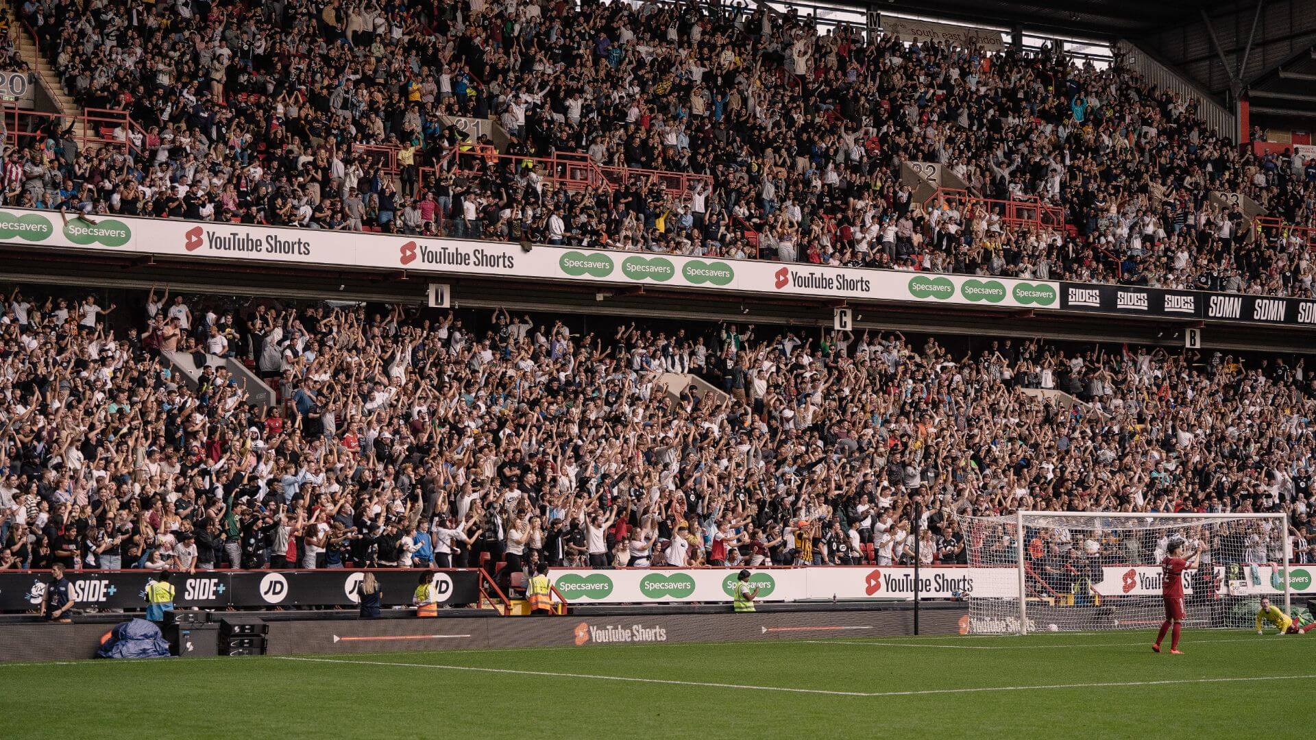 Crowd reaction of a goal being scored at the Sidemen Charity match 2022.