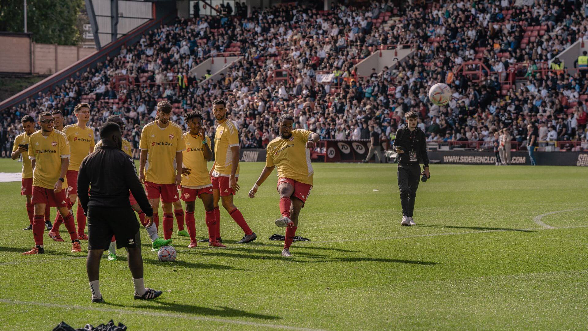 YouTube Allstars on-pitch warm-up.