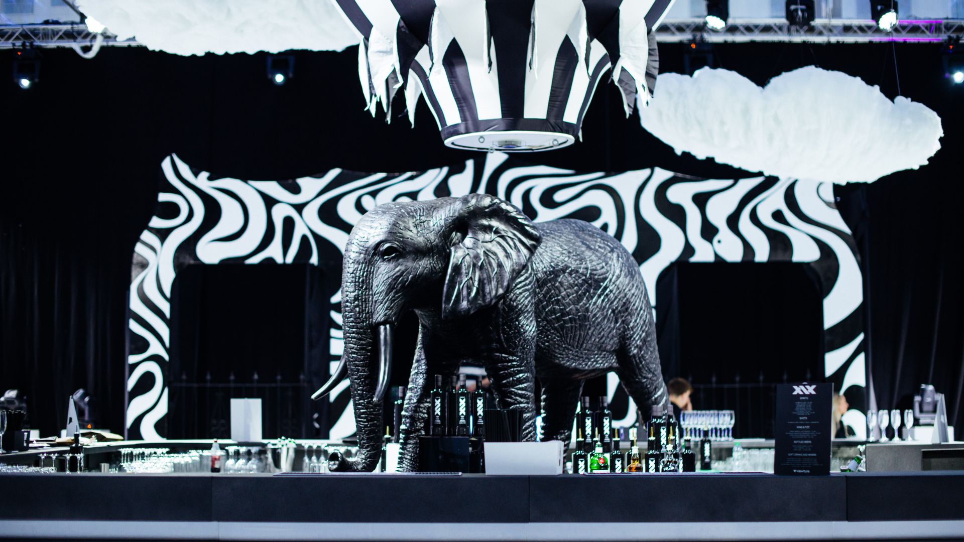 Giant black elephant prop we used as a bar centrepiece below the hot air balloon giving the illusion of a floating bar.