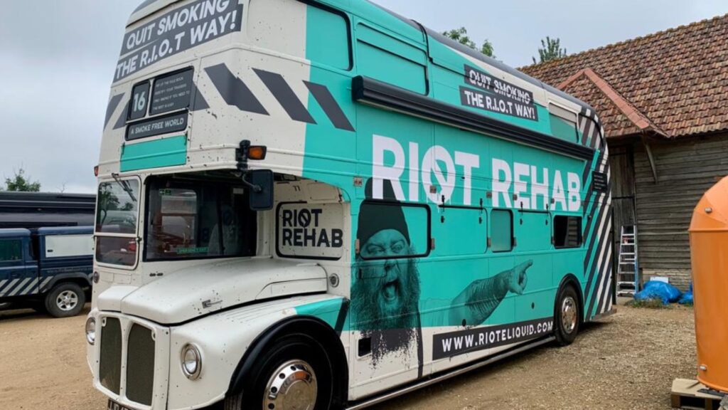 Riot Rehab branded double decker bus.