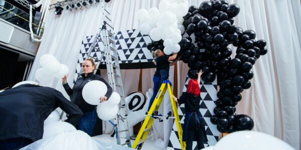 Sidemen-Charity-Match-2022-After-Party-Team-Setting-Up-Balloon-Backdrop