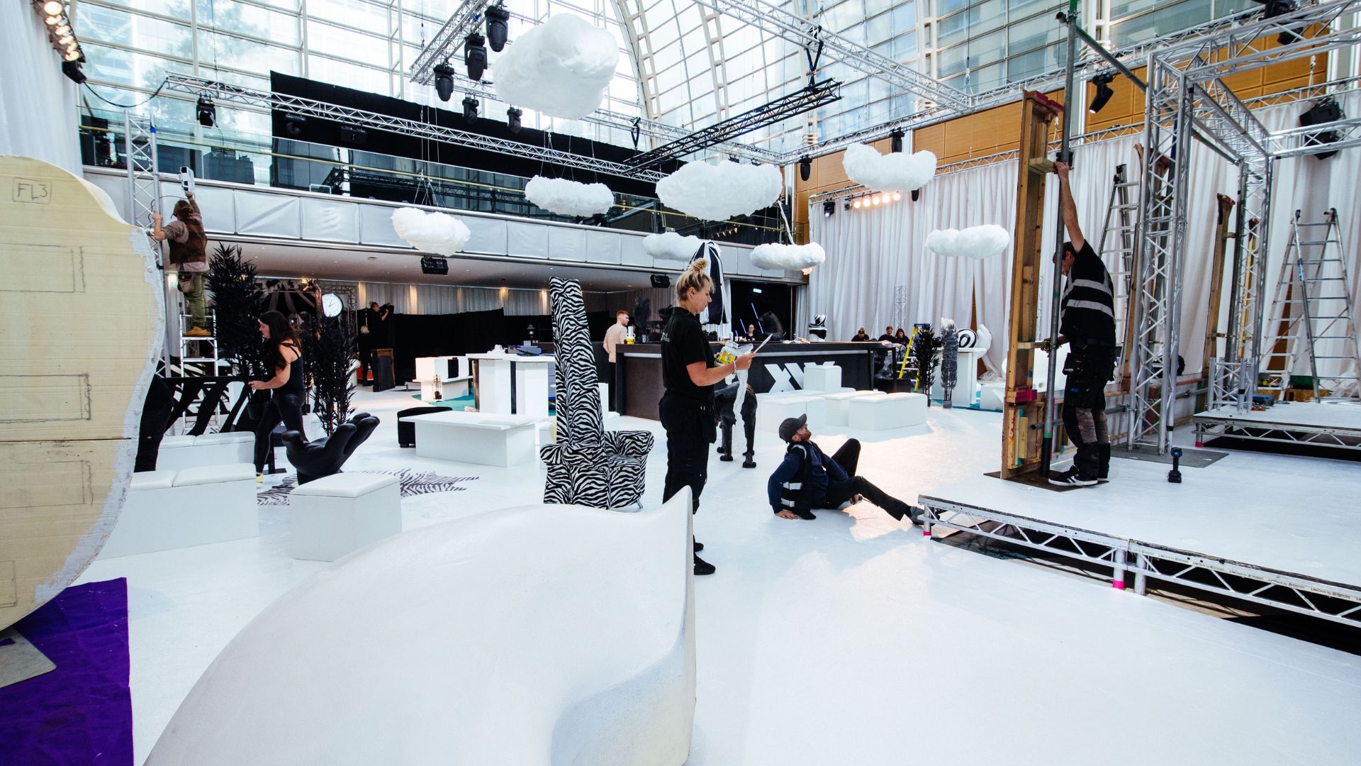 Julia Charles Event Management setting up stage area and seating areas for the Sidemen 2022 Charity Football Match After Party.