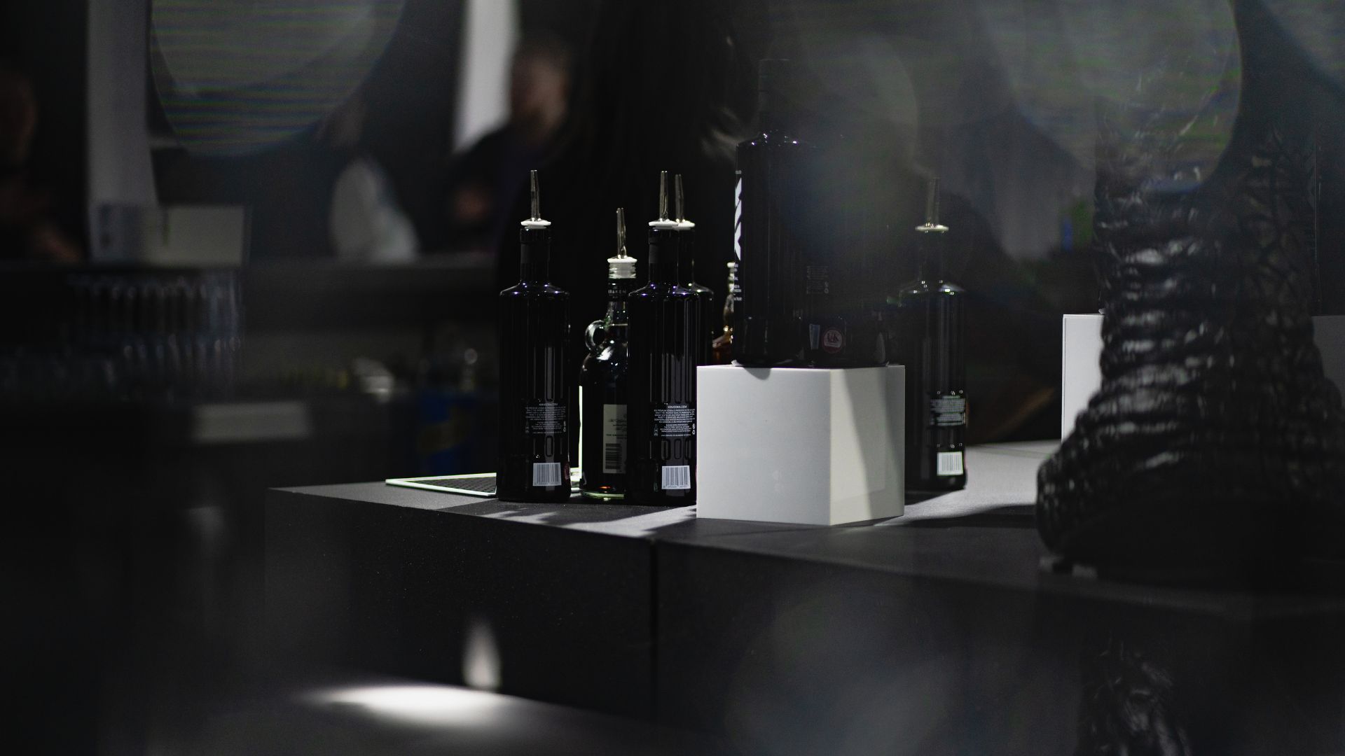 Bottles on bar surface at the Sidemen After Party for the Sidemen 2022 charity football match.