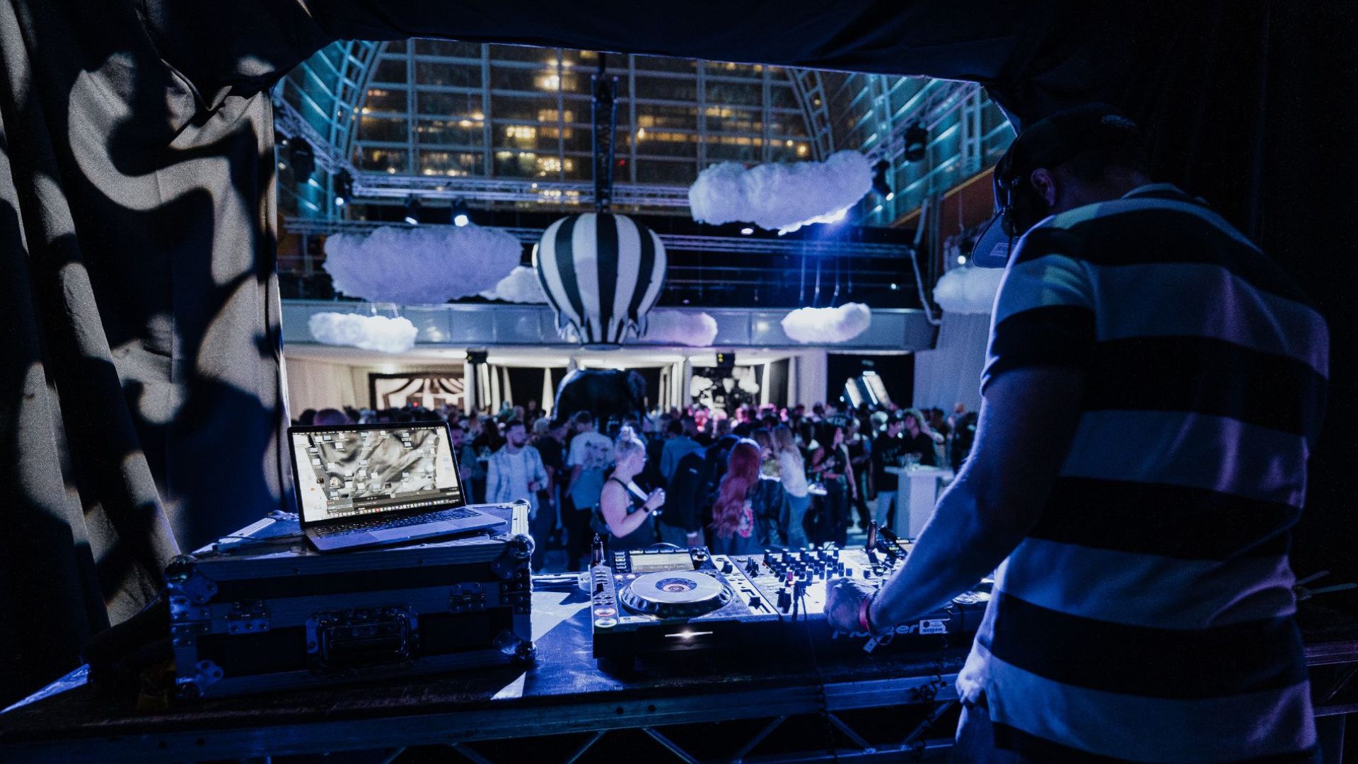 DJ performing on stage at the 2022 Sidemen Charity Match After Party.