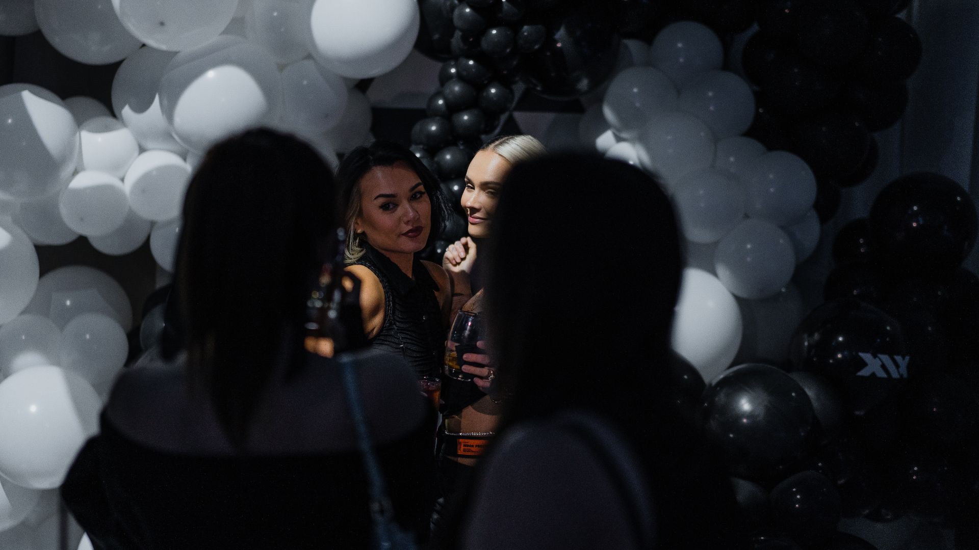 Guests taking photos at the Sidemen charity match after party.