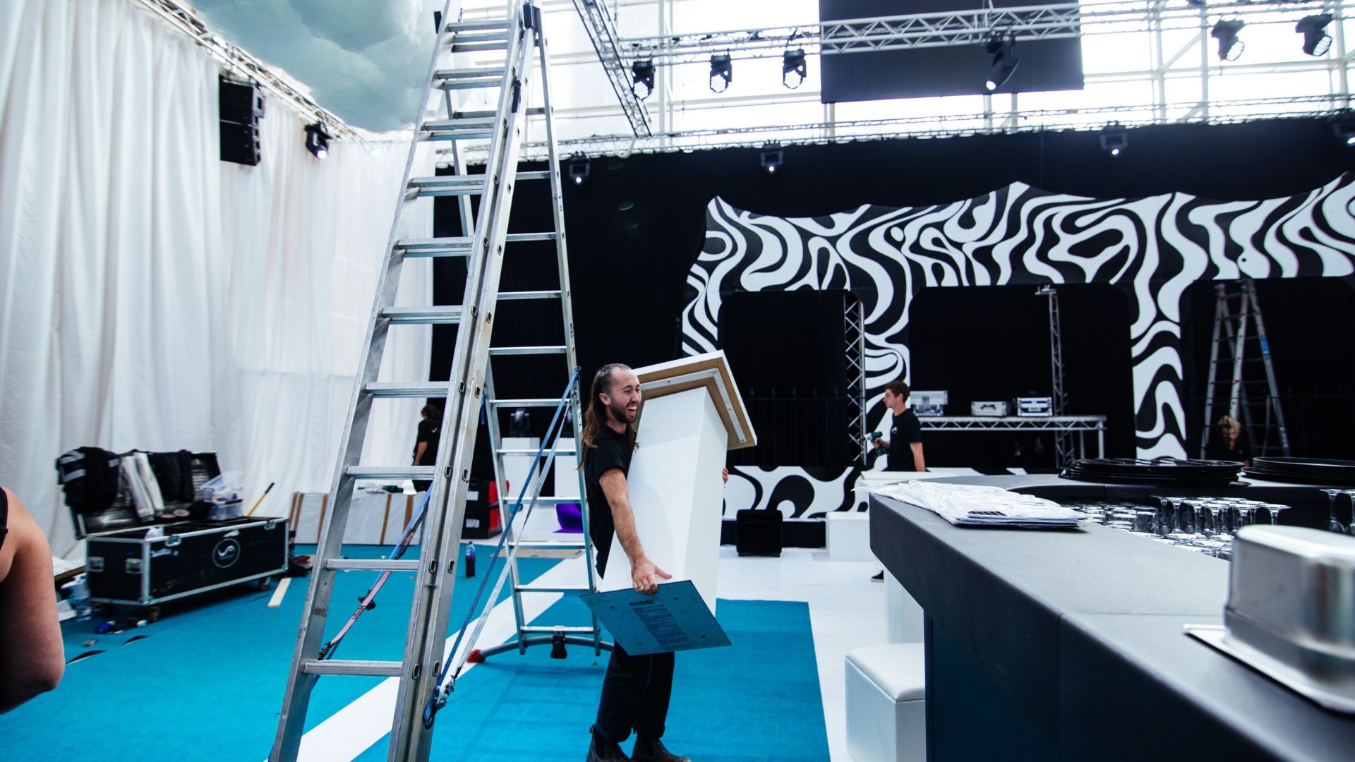 Julia Charles Event Management setting up standing tables for the Sidemen 2022 charity match after party.