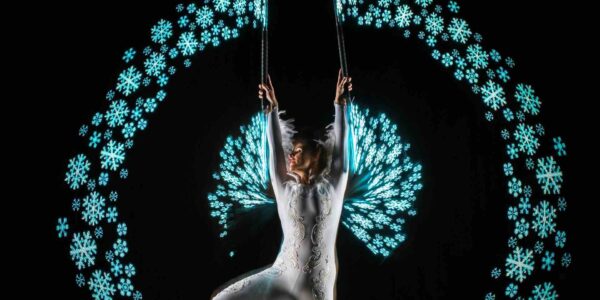 Christmas-Acrobat-Creating-LED-Snowflakes