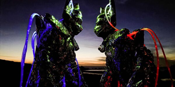 Glowing-Stilt-Performers