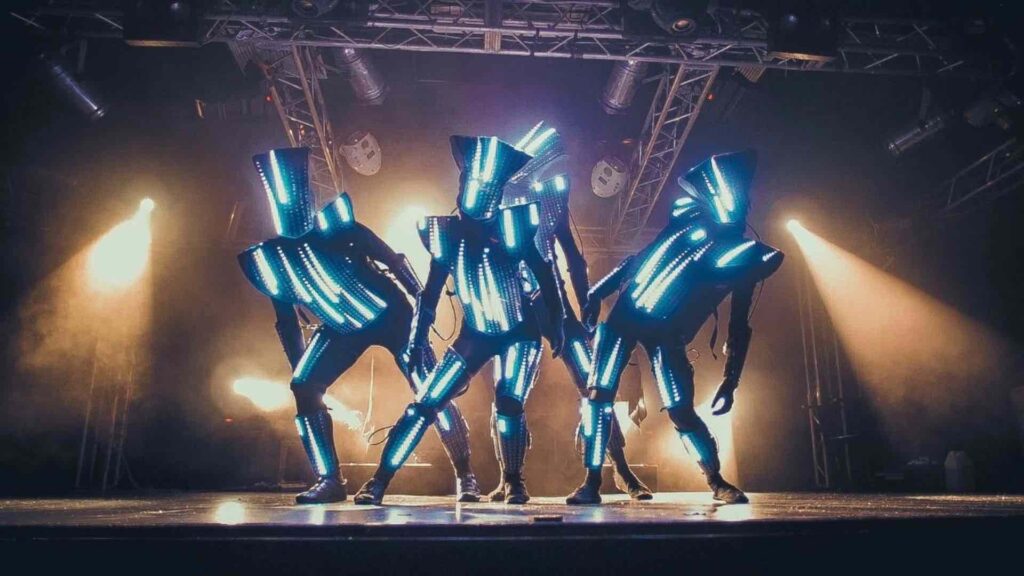 Group photo of four LED dancers