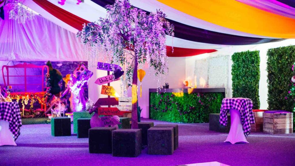 Alice In Wonderland Themed Event Production using bespoke props and draping in marquee.