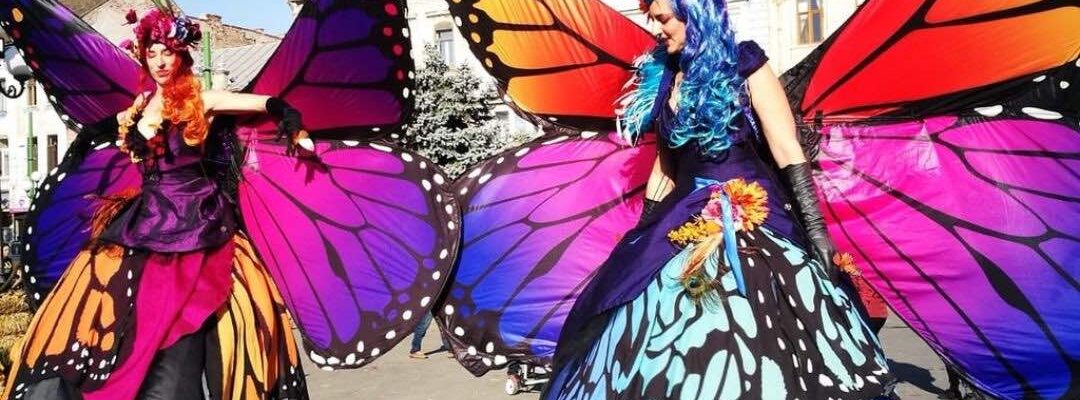 Stilt-Performers-Dressed-As-Butterflies Stilt-Performers-Dressed-As-Butterflies