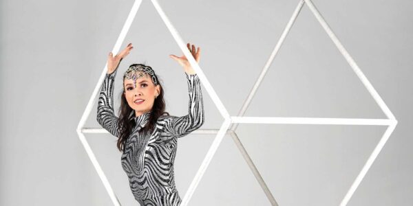 Aerialist-Sitting-In-Cube