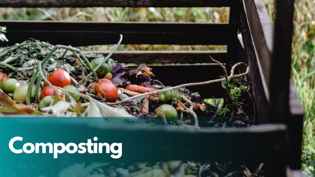 Pile of composting waste in wooden crate.