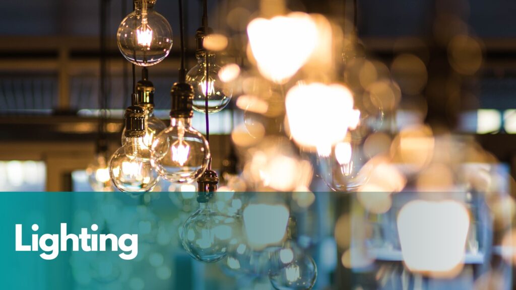 Cluster of bright light bulbs in an indoor setting.
