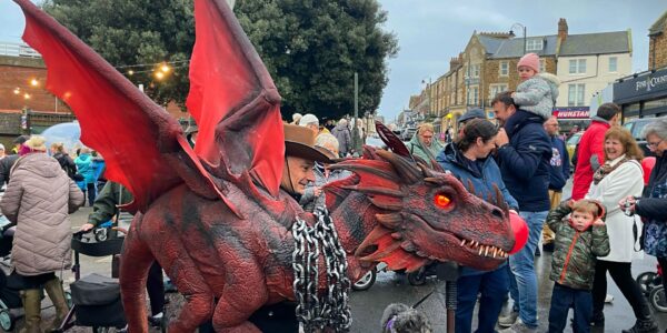 Medieval-Dragon-Interacting-In-Street