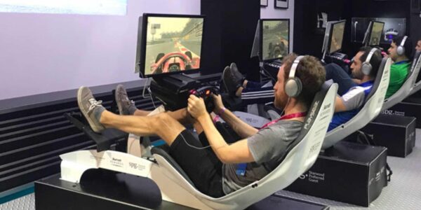 Attendee-Competing-On-Racing-Motorsport-Simulator