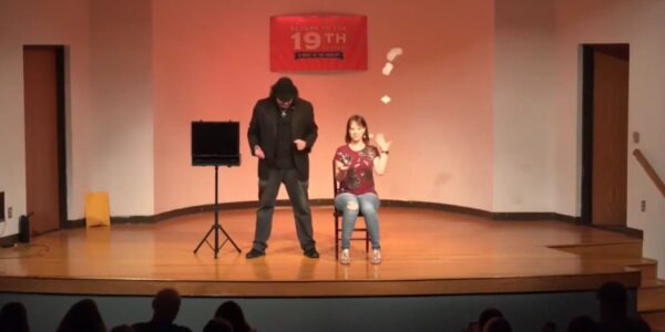 Comedian-On-Stage-With-Audience-Member