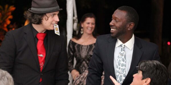 Comedy-Magician-Holding-Card-In-Mouth