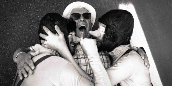Comedy-Walkabout-Duo-Hugging-Passerby