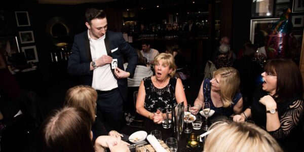 Corporate-Event-Magician-With-Crowd