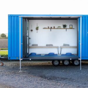 A converted truck unit with a white and wood interior used for meditation sessions