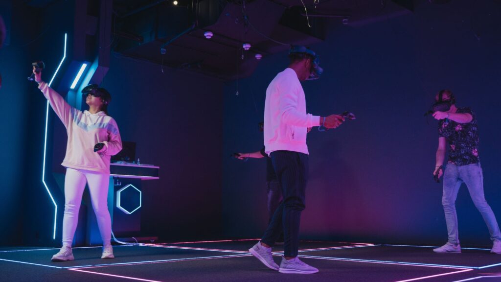 Two people wearing VR headsets.
