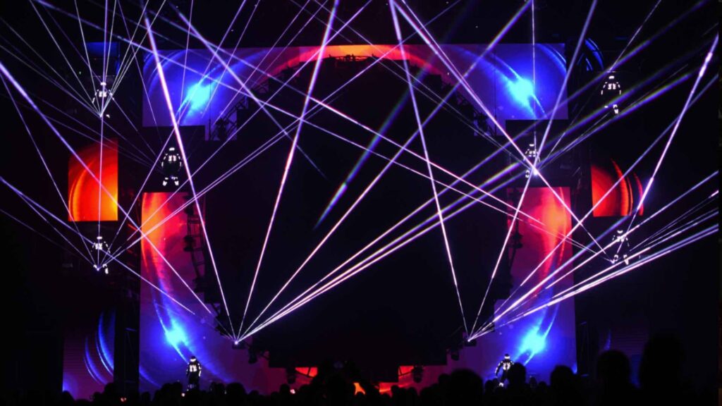 Colourful lasers fill the venue and LED poi dancers
