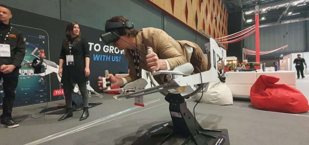 Person-Using-Flying-VR-Machine-At-Event