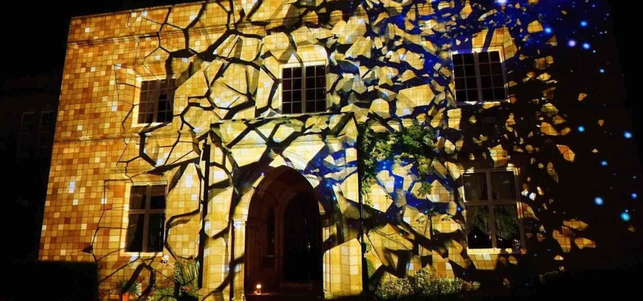Projection-On-House-With-Shattered-Brick-Effect